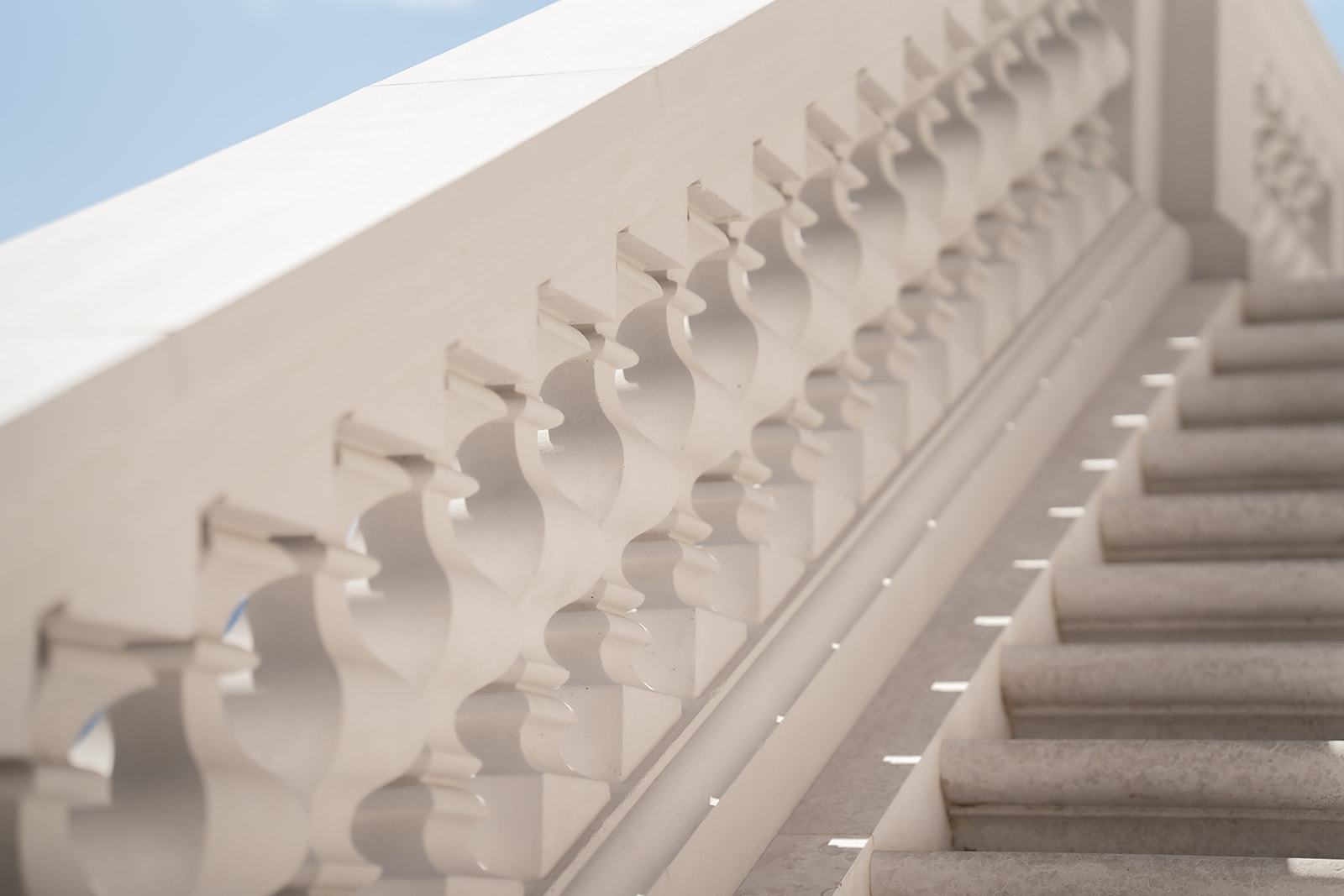Detail of the sculpted balustrade against the sky